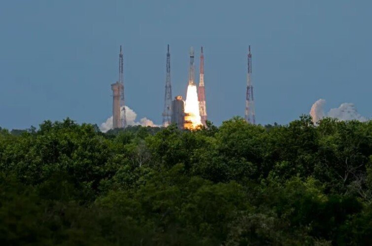 India launches rocket to land spacecraft on moon