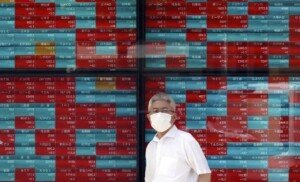 Asian markets rally on Fed rate hopes, oil eases after surge