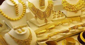 Gold price lowered by Tk 1,084 per bhori