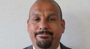 Councillor charged over ‘cut throat’ protest remarks