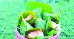 Traditional Palm pitha in jackfruit leaves