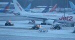 Flights and trains cancelled as snow hits UK