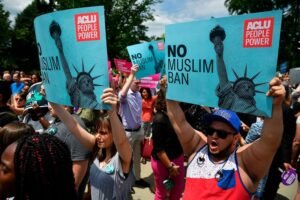 Trump issues travel bans on people from 12 countries