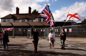 UK wins court ruling to keep asylum seekers in hotel but risks angry response