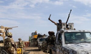 At least 63 killed in jihadist attack on resettled town in northeast Nigeria