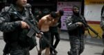 At least 64 killed in Rio as police launch largest-ever raids on drug gangs