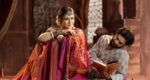 Durga Puja celebration with traditional clothes