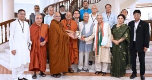 Buddhist leaders exchange greetings with CA marking Probarona Purnima