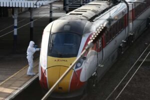 UK train stabbings injure nine, police arrest two suspects