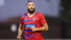 Ex-England striker Carroll due in court after arrest