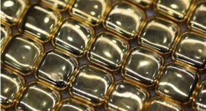 Gold, silver hit records, stocks fall as Trump fans trade fears