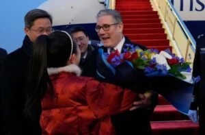 Keir Starmer handed bouquet of flowers as he arrives in China for high-profile visit
