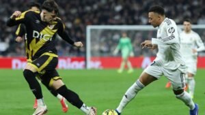 Mbappe earns Real Madrid late win over nine-man Rayo