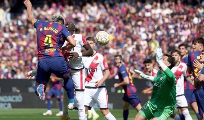 Real Madrid down Atletico in derby, leaders Barca edge Rayo