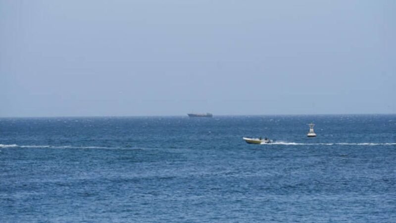 Hormuz at near standstill as Iran warns ships to keep to its waters
