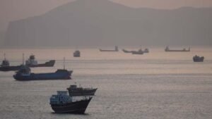 Iran hits ships and UAE oil port in show of force after Trump orders Navy to open strait