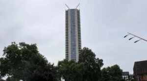 Child among three dead in tower block fall