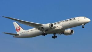 Japan cancels 100 flights as twin storms approach