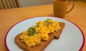 Scrambled eggs will be tastier if you swap milk and butter for a much better ingredient