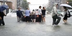 Record rain hits Japan, highest flood alert issued