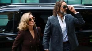 Russell Brand appears in court for start of rape trial